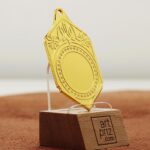 Медаль МА095 Золото прямокутна з гербом України місце під Жетон D25мм (65*40мм)